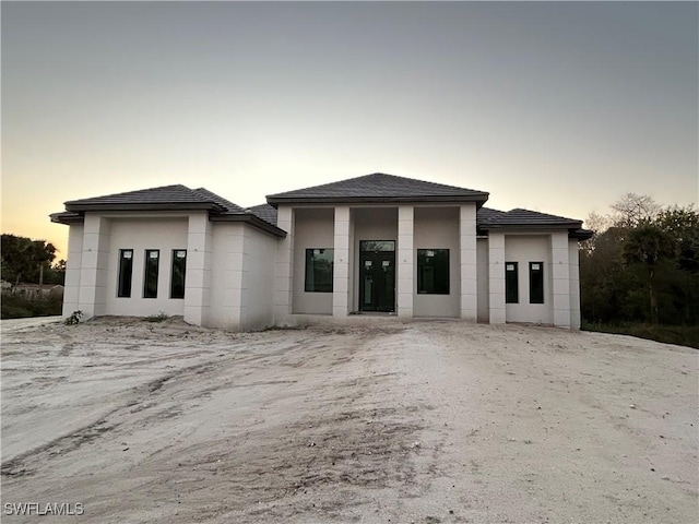 prairie-style house featuring elevator