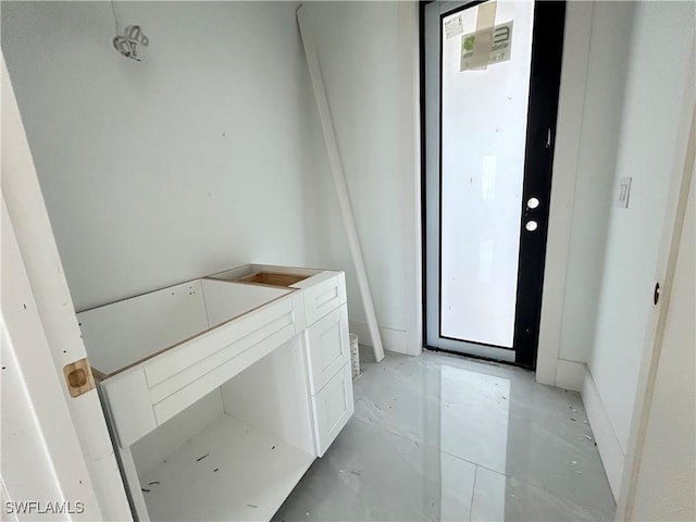 bathroom featuring toilet and a wealth of natural light