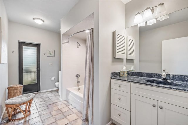 full bathroom with toilet, vanity, and tub / shower combination