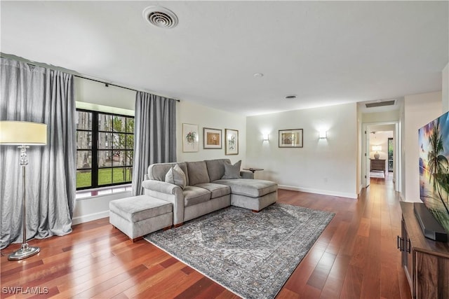 living room with wood-type flooring