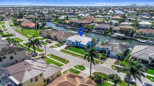 drone / aerial view featuring a water view