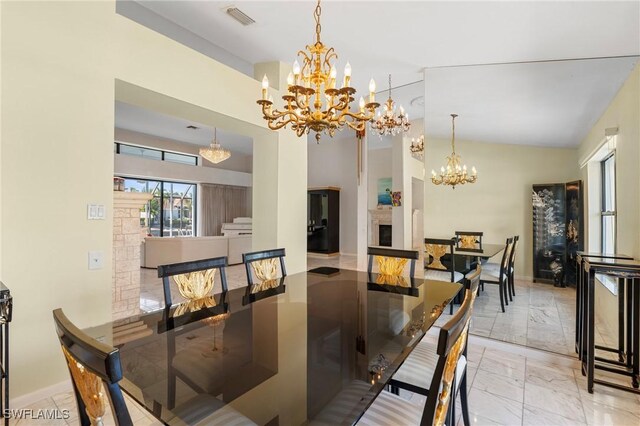 dining space featuring an inviting chandelier