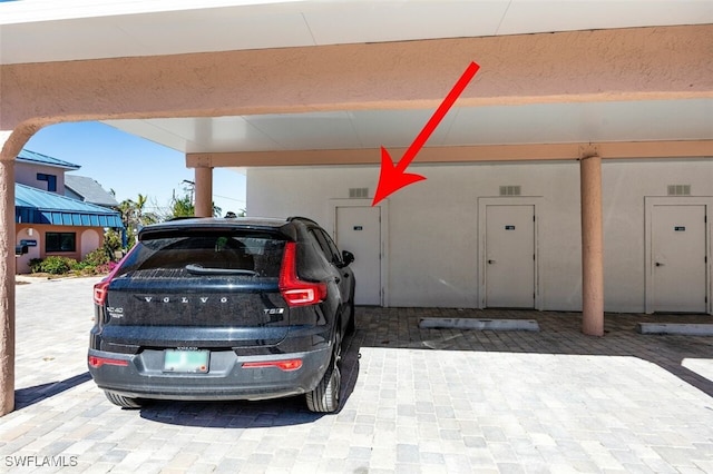 garage with a carport