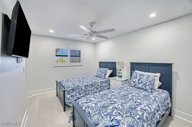 bedroom featuring light hardwood / wood-style floors and ceiling fan