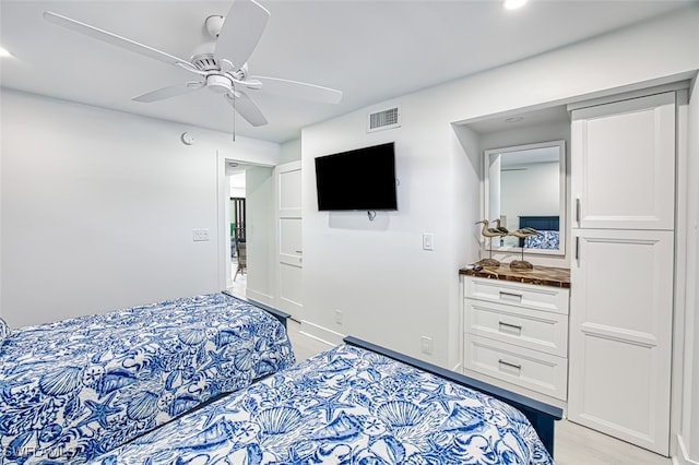 bedroom featuring ceiling fan and light hardwood / wood-style floors