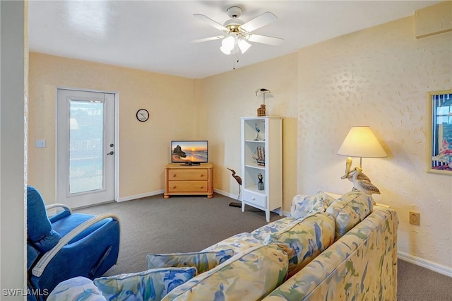 living room with ceiling fan, carpet flooring, and baseboards