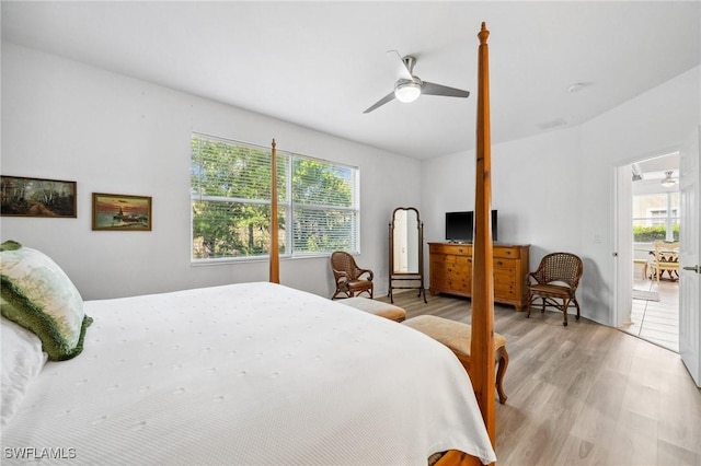 bedroom with ceiling fan and light wood-type flooring