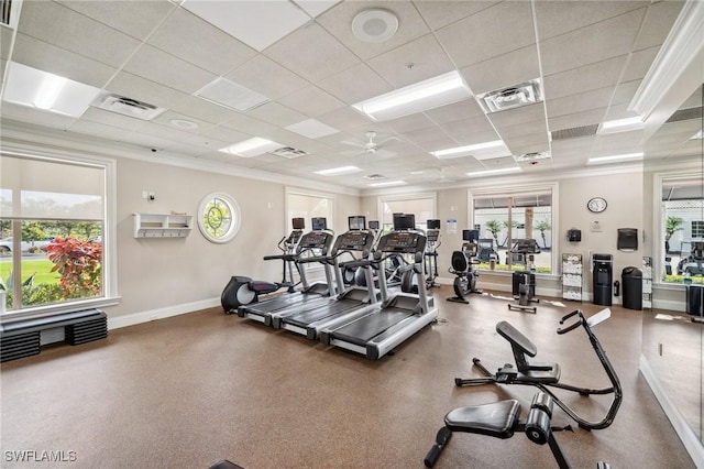 gym featuring crown molding and a paneled ceiling