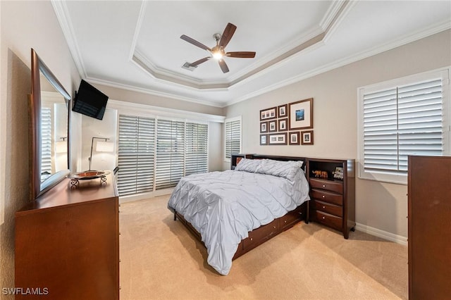 1813 Senegal Date Dr, Naples, FL 34119 - bedroom featuring light carpet, ornamental molding, a tray ceiling, ceiling fan, and baseboards