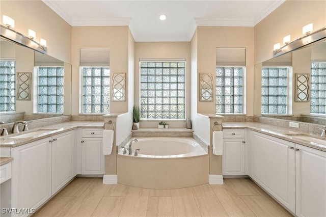 1813 Senegal Date Dr, Naples, FL 34119 - bathroom with plenty of natural light, a bath, two vanities, and crown molding