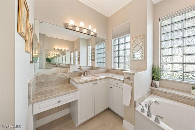 1813 Senegal Date Dr, Naples, FL 34119 - full bath with healthy amount of natural light, ornamental molding, a garden tub, and vanity