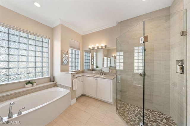 1813 Senegal Date Dr, Naples, FL 34119 - bathroom with vanity, a bath, a stall shower, tile patterned flooring, and ornamental molding