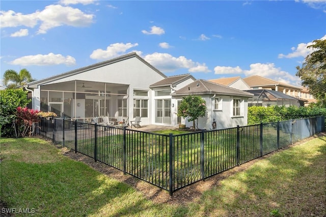 1813 Senegal Date Dr, Naples, FL 34119 - rear view of property with a sunroom, stucco siding, and a ceiling fan