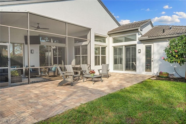 1813 Senegal Date Dr, Naples, FL 34119 - rear view of house featuring a patio area, stucco siding, a tile roof, and ceiling fan
