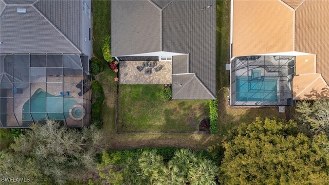 1813 Senegal Date Dr, Naples, FL 34119 - drone / aerial view of a pool area