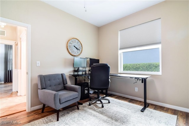 office space featuring hardwood / wood-style floors