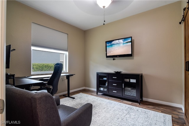 office space with ceiling fan and hardwood / wood-style floors