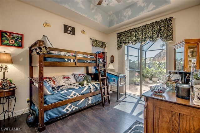 bedroom with dark wood-type flooring, access to exterior, and ceiling fan