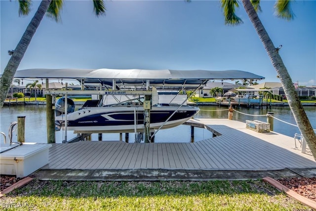 view of dock featuring a water view and boat lift