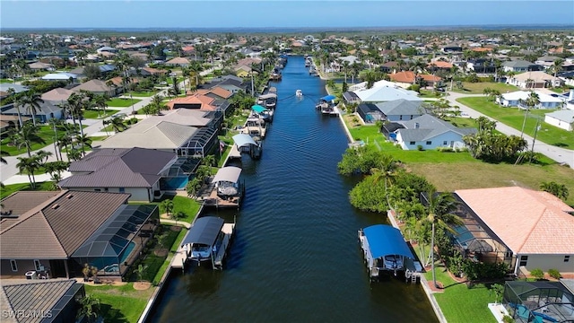 aerial view with a residential view and a water view