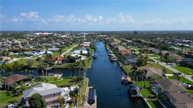 aerial view featuring a water view and a residential view