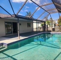 outdoor pool with a patio