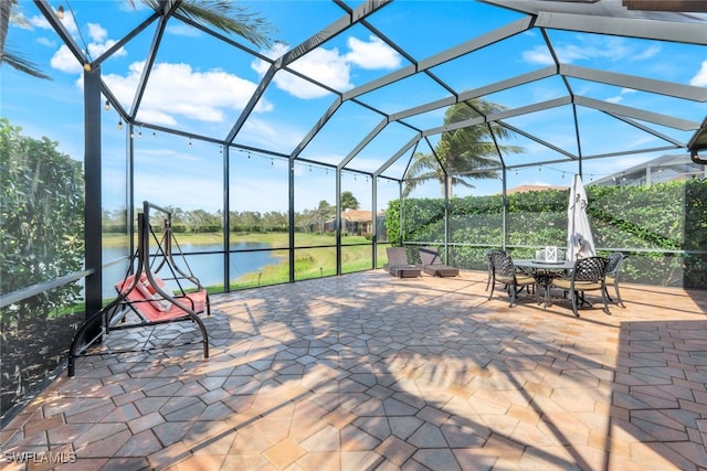 3366 Baltic Dr, Naples, FL 34119 - view of patio with a water view and a lanai