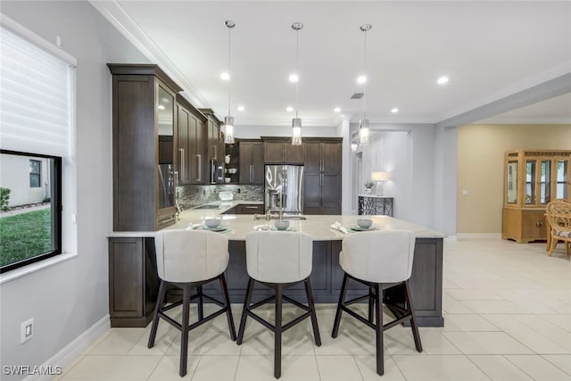 3366 Baltic Dr, Naples, FL 34119 - kitchen with dark brown cabinetry, stainless steel fridge with ice dispenser, glass insert cabinets, a kitchen breakfast bar, and hanging light fixtures
