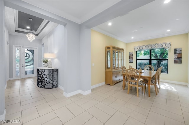 3366 Baltic Dr, Naples, FL 34119 - dining area featuring a notable chandelier, crown molding, light tile patterned floors, recessed lighting, and baseboards