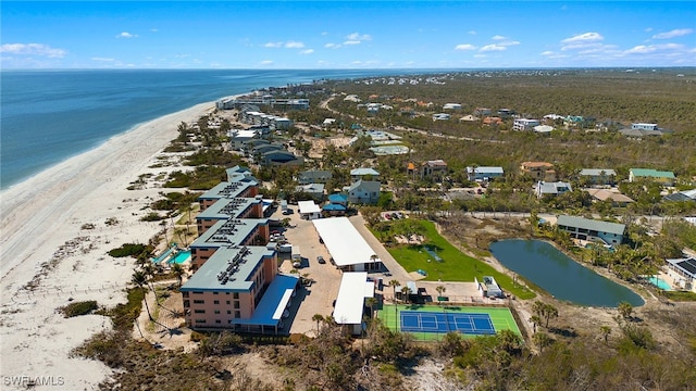 aerial view with a water view and a view of the beach