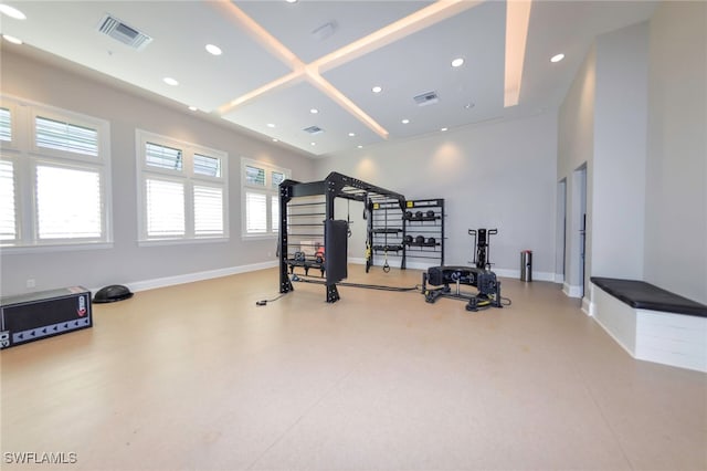 workout area featuring baseboards, recessed lighting, and visible vents