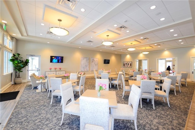 dining area featuring baseboards, a wealth of natural light, visible vents, and carpet floors