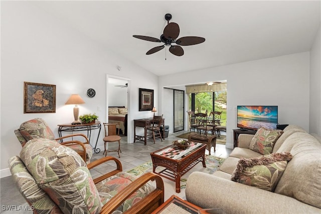 living area featuring lofted ceiling, light tile patterned floors, and ceiling fan