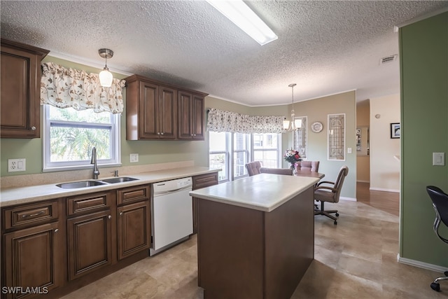 kitchen with dark brown cabinetry, sink, dishwasher, a kitchen island, and pendant lighting