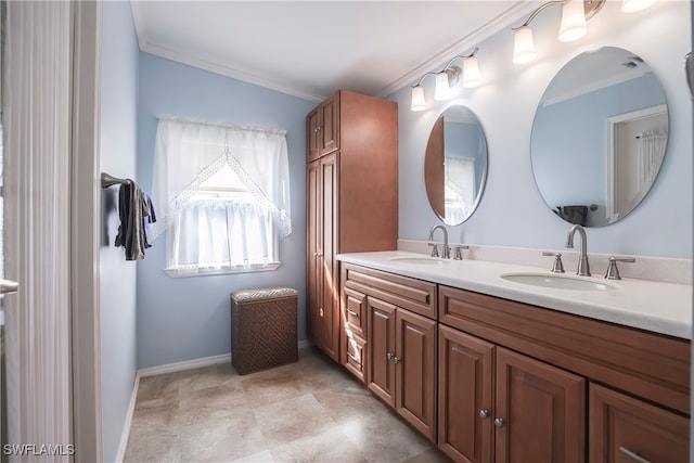 bathroom featuring ornamental molding and vanity