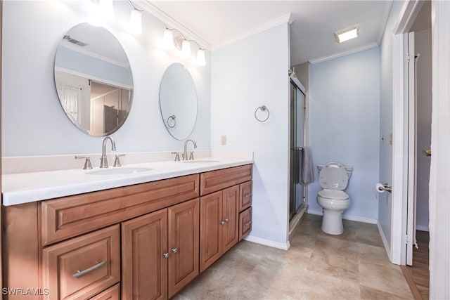 bathroom featuring ornamental molding, vanity, an enclosed shower, and toilet