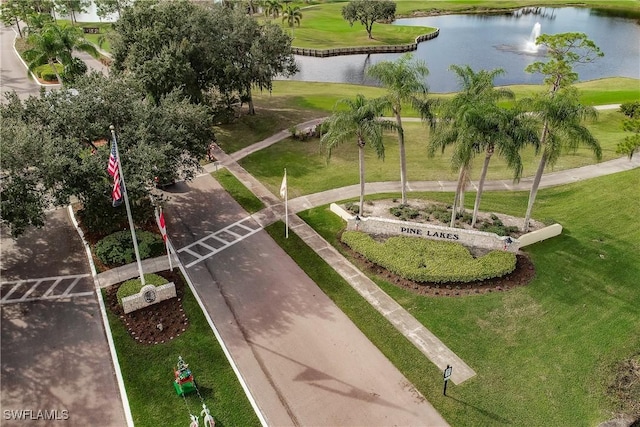 view of home's community with a water view