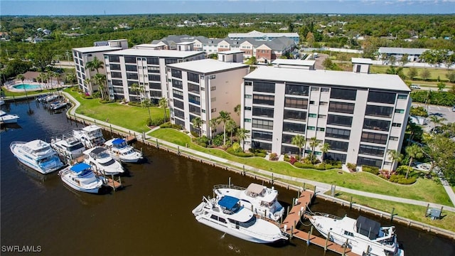 birds eye view of property featuring a water view