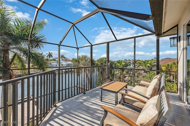 exterior space with a water view and a balcony