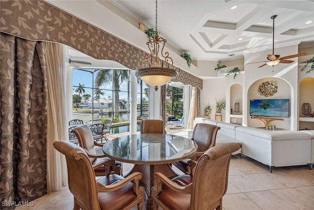 tiled dining space with beam ceiling, a high ceiling, ceiling fan, coffered ceiling, and ornamental molding