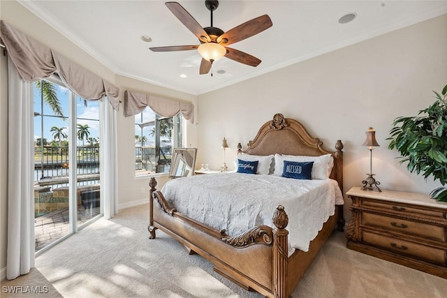 carpeted bedroom featuring a water view, crown molding, access to exterior, and ceiling fan