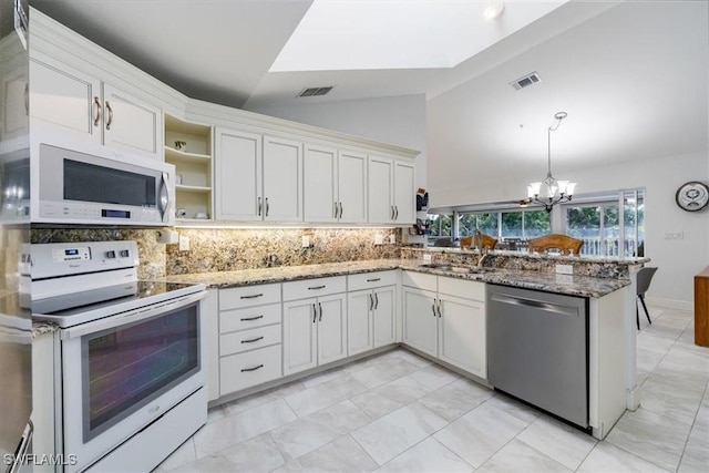 kitchen featuring white electric stove, open shelves, stainless steel dishwasher, and white cabinets