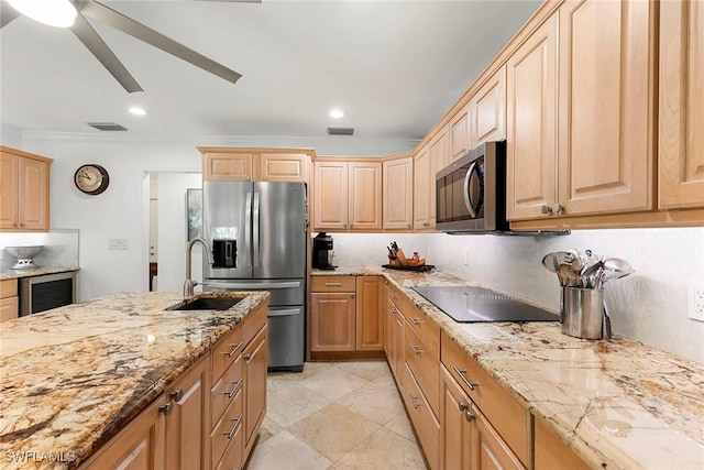 kitchen featuring wine cooler, light stone countertops, visible vents, and stainless steel appliances