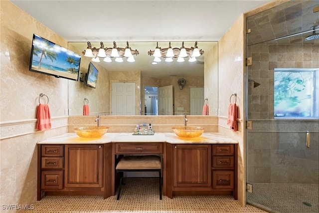 full bath featuring a sink and tile walls