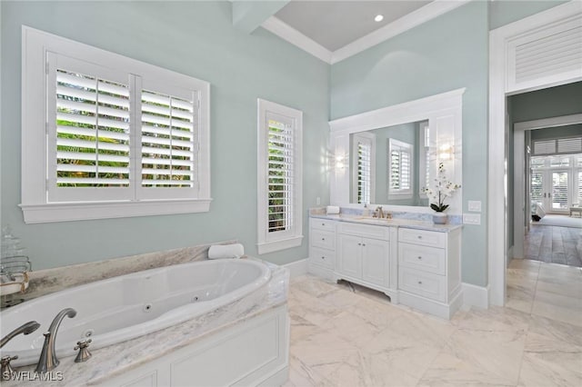 532 Pine Grove Ln, Naples, FL 34103 - bathroom with vanity, ornamental molding, marble finish floor, baseboards, and a whirlpool tub