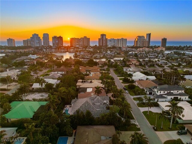 532 Pine Grove Ln, Naples, FL 34103 - aerial overview of property's location featuring skyline and a nearby body of water