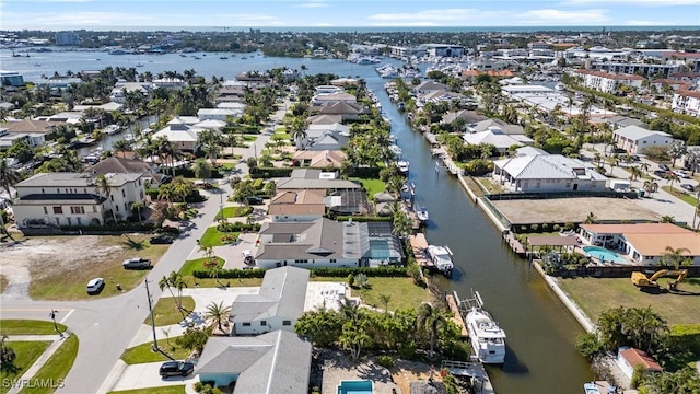 aerial view featuring a water view and a residential view