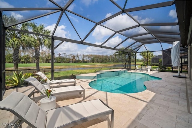 view of pool featuring a patio, glass enclosure, and a water view