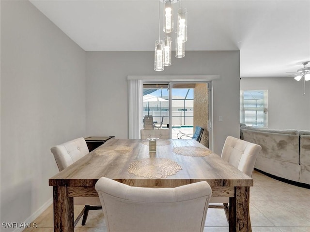 dining space featuring ceiling fan