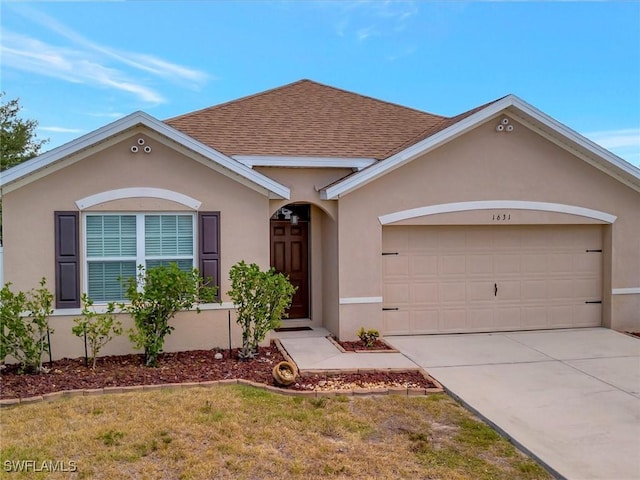 ranch-style house with a garage and a front yard